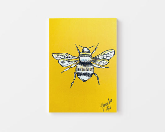 This yellow portrait oriented piece features a bee illustration created using an artistic technique called ink and bleach