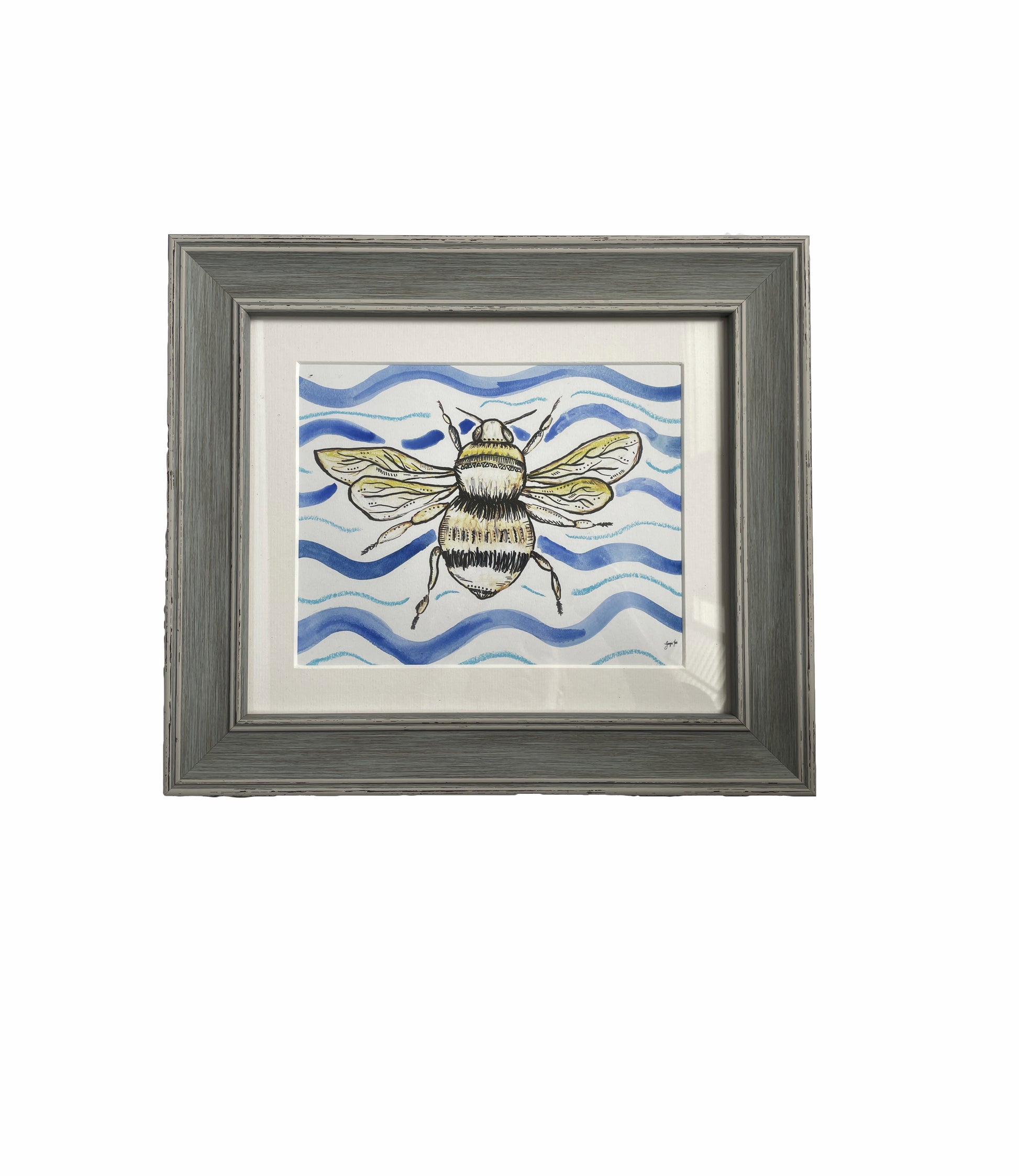 A framed bee print (A4) with blue hand painted watercolour and oil pastel background. 