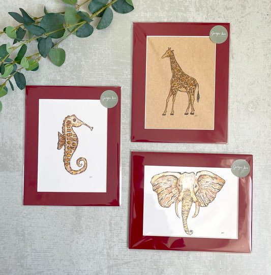 Seahorse, Giraffe & Elephant prints with red mounts