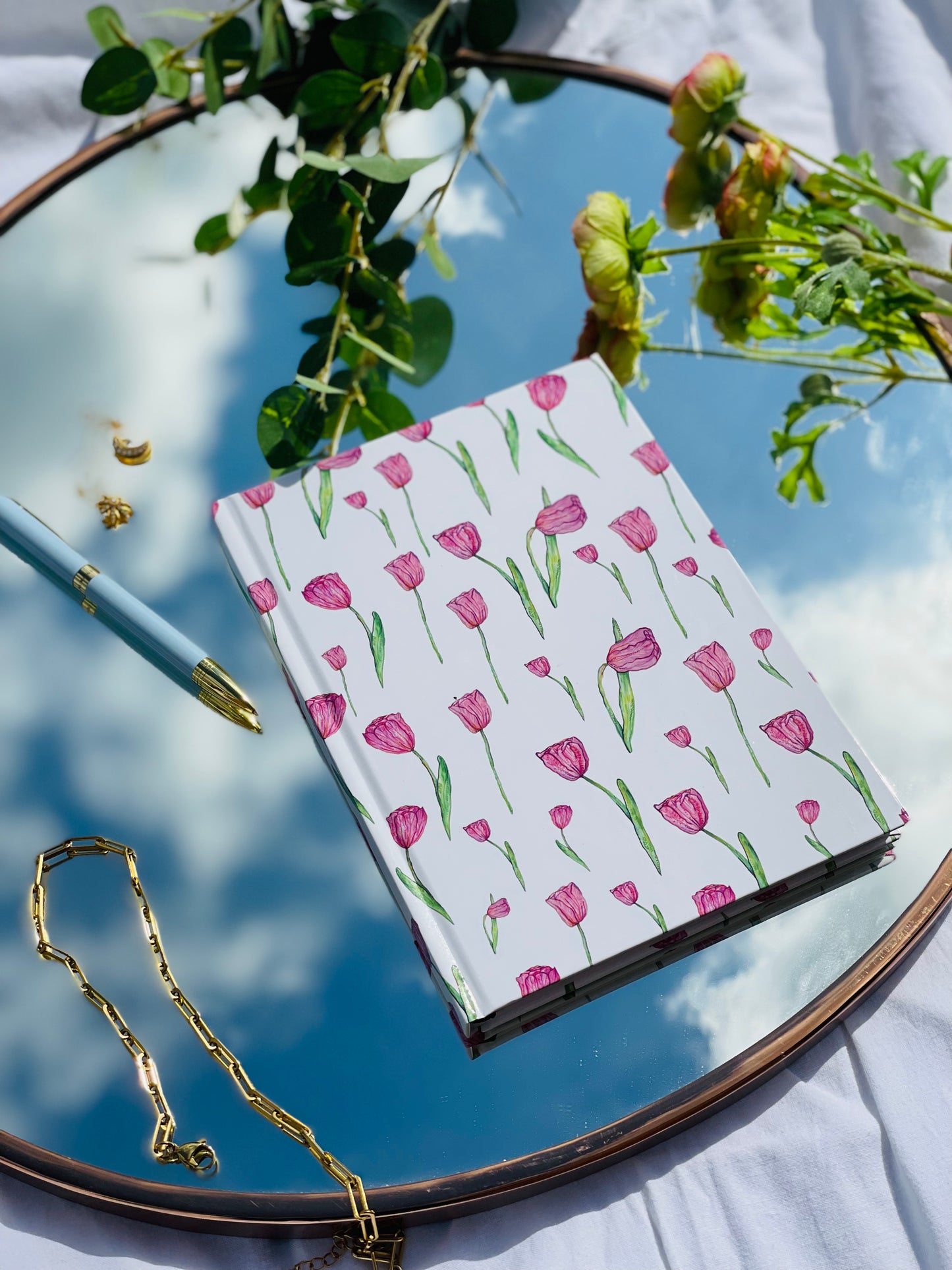 Premium hardback pink tulip notebook designed in the UK