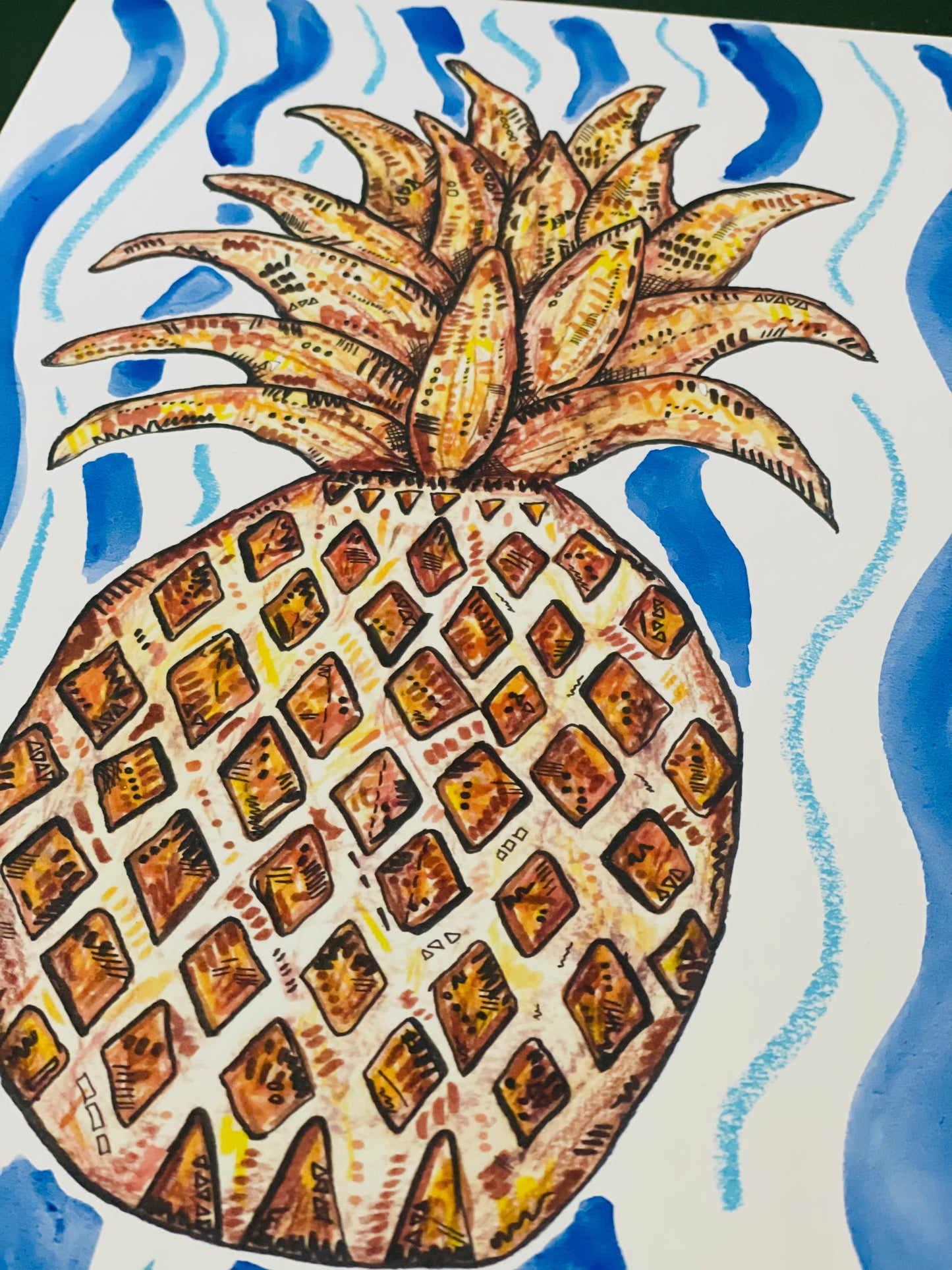 A pineapple print (A4) with blue hand painted watercolour and oil pastel background. 