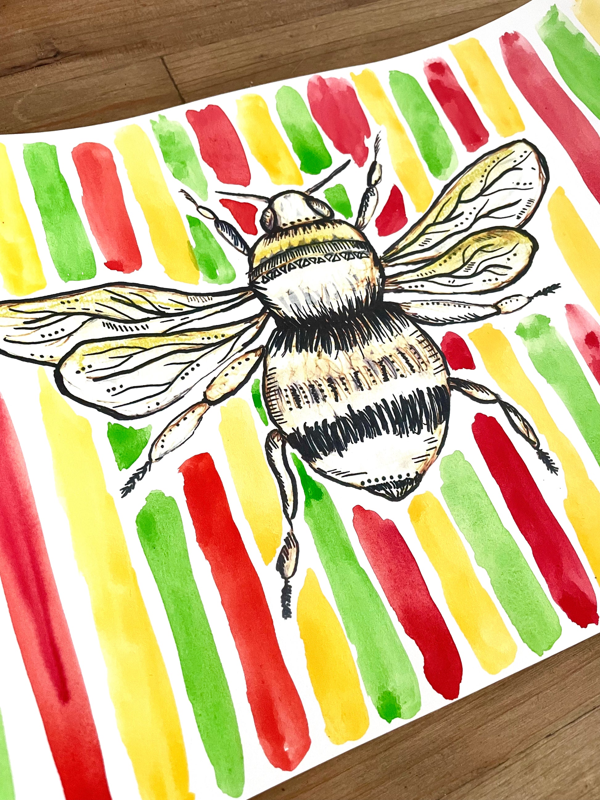 A bee print (A4) with yellow, red and black hand painted watercolour background.