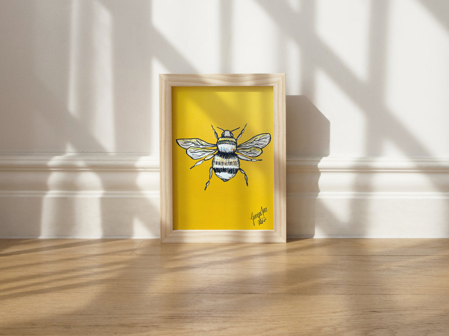 This yellow portrait oriented piece features a bee illustration created using an artistic technique called ink and bleach