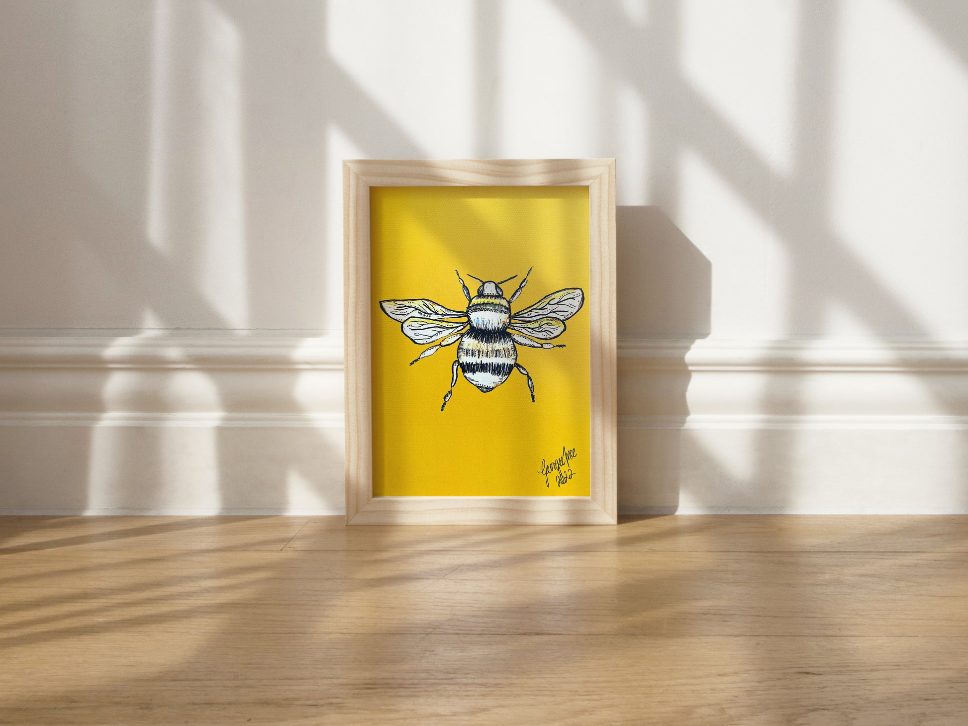 This yellow portrait oriented piece features a bee illustration created using an artistic technique called ink and bleach